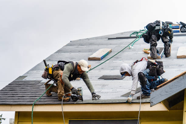 Professional Roofing technician working in Falmouth, ME
